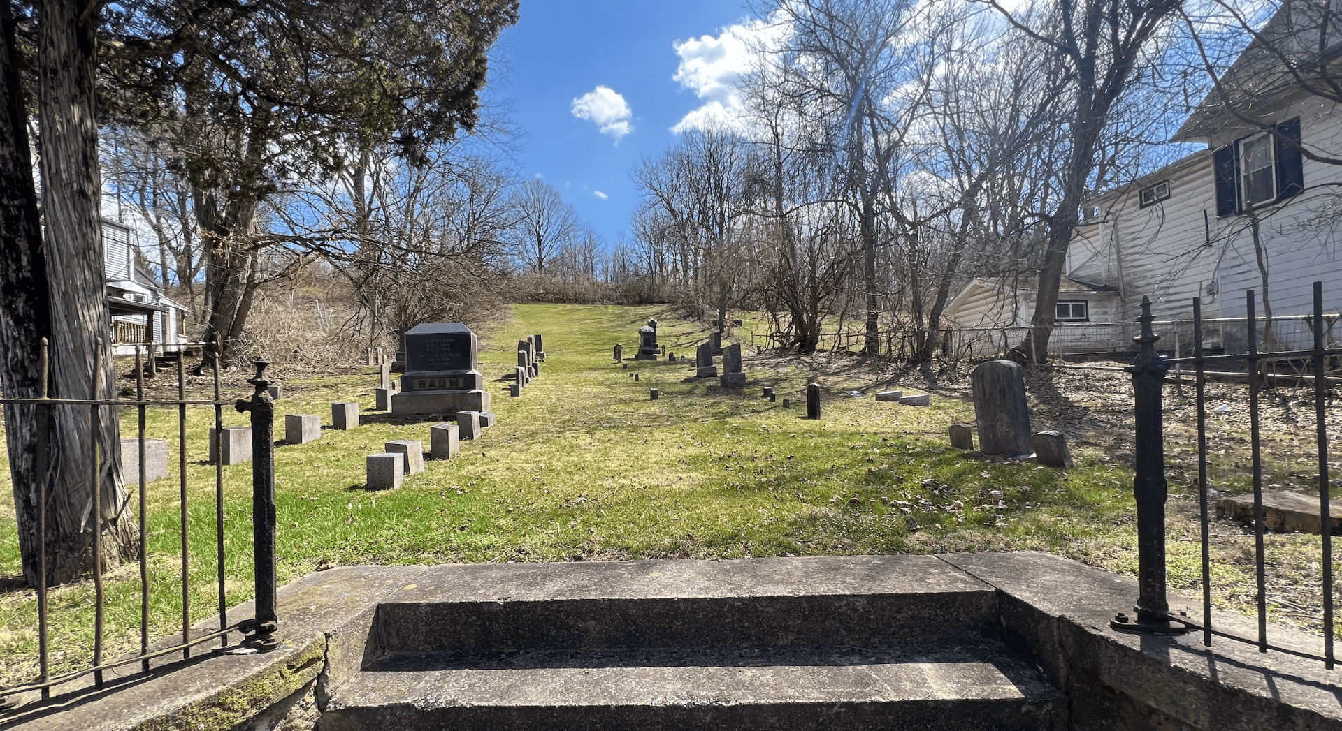 Entrance to the Rodef Shalom Cemetery showing two steps in the bottom center